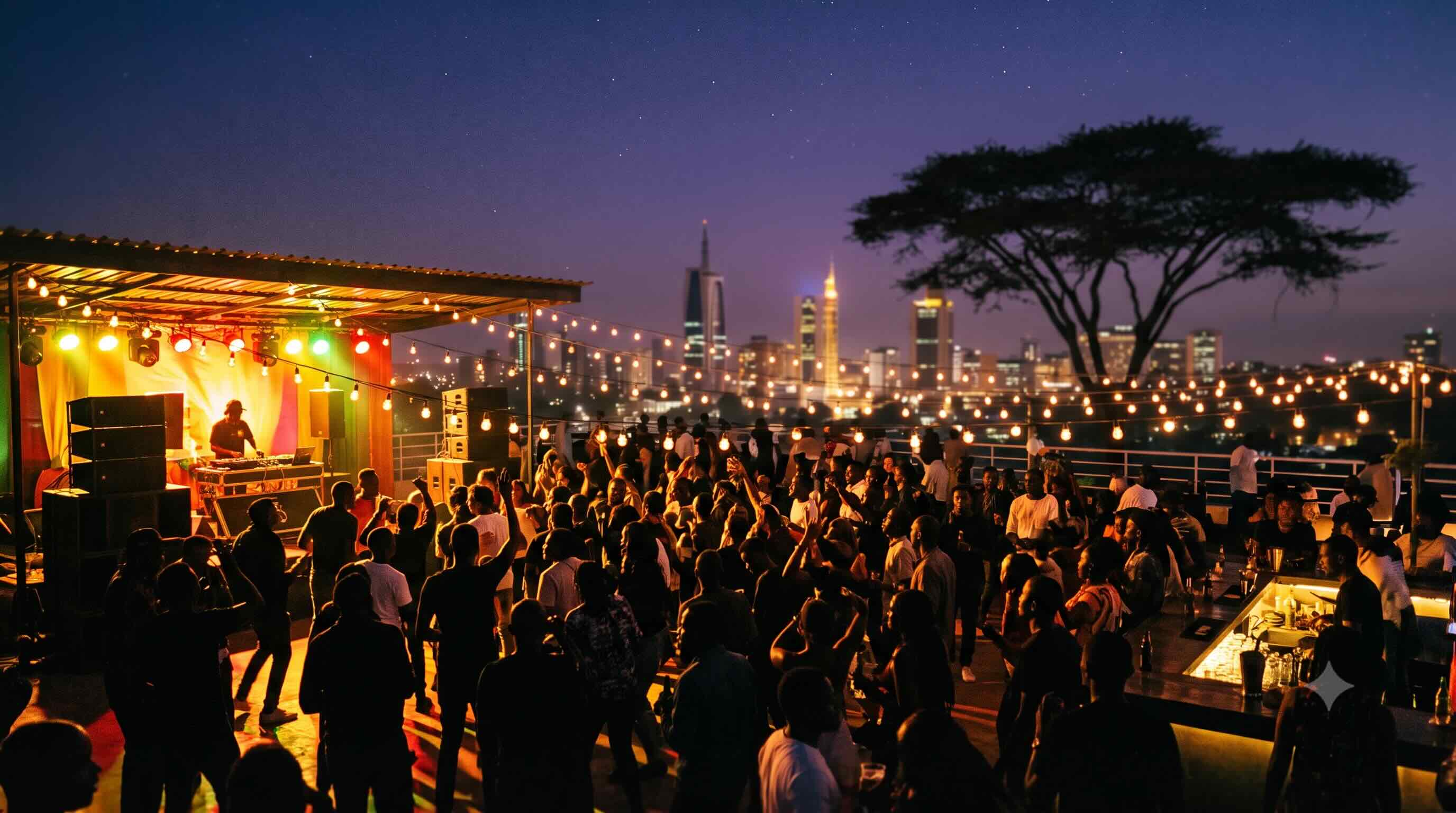 Creators Night Nairobi — a rooftop crowd at dusk, string lights and the stage against the city skyline